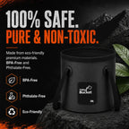 A black 20L collapsible camping bucket stands firmly on a dark textured rock, with rugged mountains and a fresh green leaf in the background. Bold distressed white and orange headlines proudly state '100% SAFE. PURE & NON-TOXIC.' Three orange hexagonal icons cleanly showcase its premium eco-friendly material certifications: 'BPA-Free', 'Phthalate-Free', and 'Eco-Friendly', making it perfectly safe for camp food prep, washing gear, and outdoor survival.
